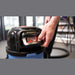Hand sliding an NX300 lithium battery into the WVB 370NX