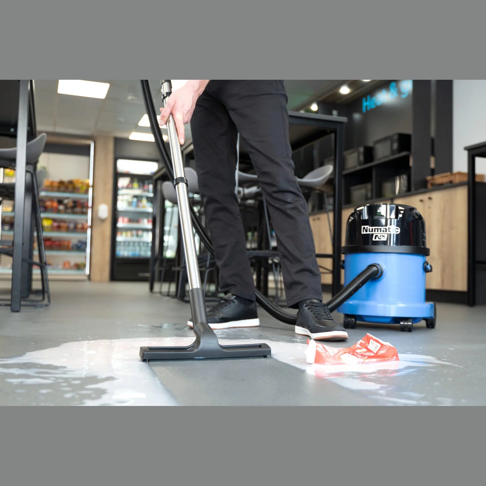 WVB 370NX cleaning up in a busy facility with no cord on the floor