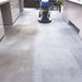 HOS Orbot LiFE Oscilating Orbital Floor Machine Cleaning Office Carpet showing the clean path as opposed to the still dirty part