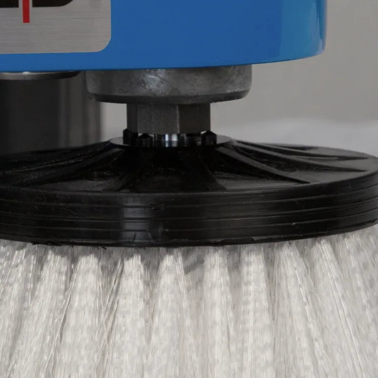 Close-up of a white carpet and tile brush fitted to one of the Orbot Micro heads