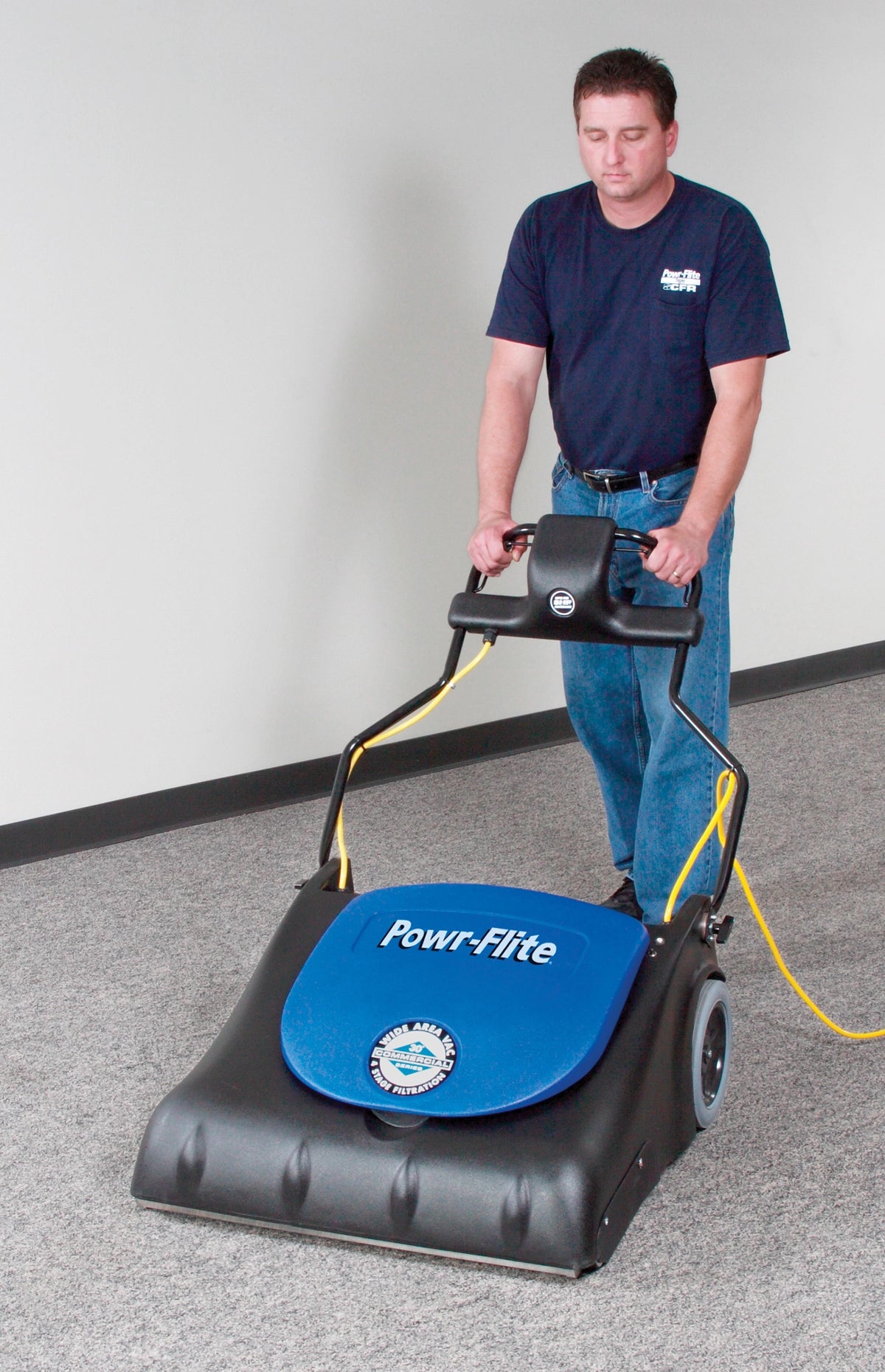 Powr Flite PF2030 30” Wide Area Vacuum In Use Perspective Photo