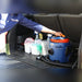 Lifting the Newton canister vacuum into a vehicle by its carry handle