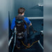 Operator vacuuming carpeted stairs while wearing a Comfort Pro backpack vacuum
