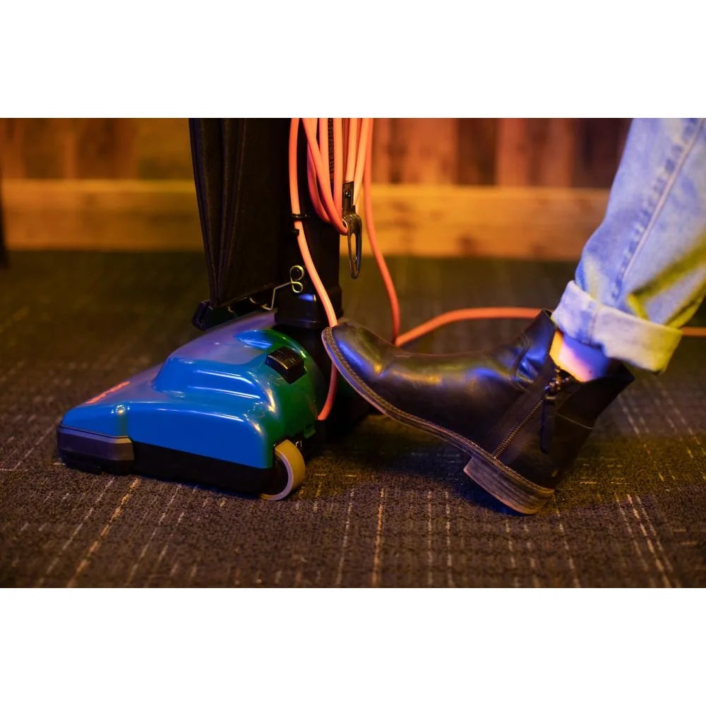 Foot pressing the toe switch on the Powr-Flite Solar's nozzle