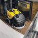 Tornado BD 17/6 compact scrubber cleaning a tight space beside a counter