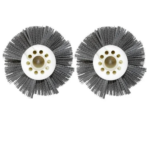 Two Tornado 90081 Tynex escalator brushes seen end on, dark gray abrasive bristles around white cores