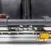 Close-up of the Tornado Cascade 20 cleaning head and its solution and vacuum hose connections