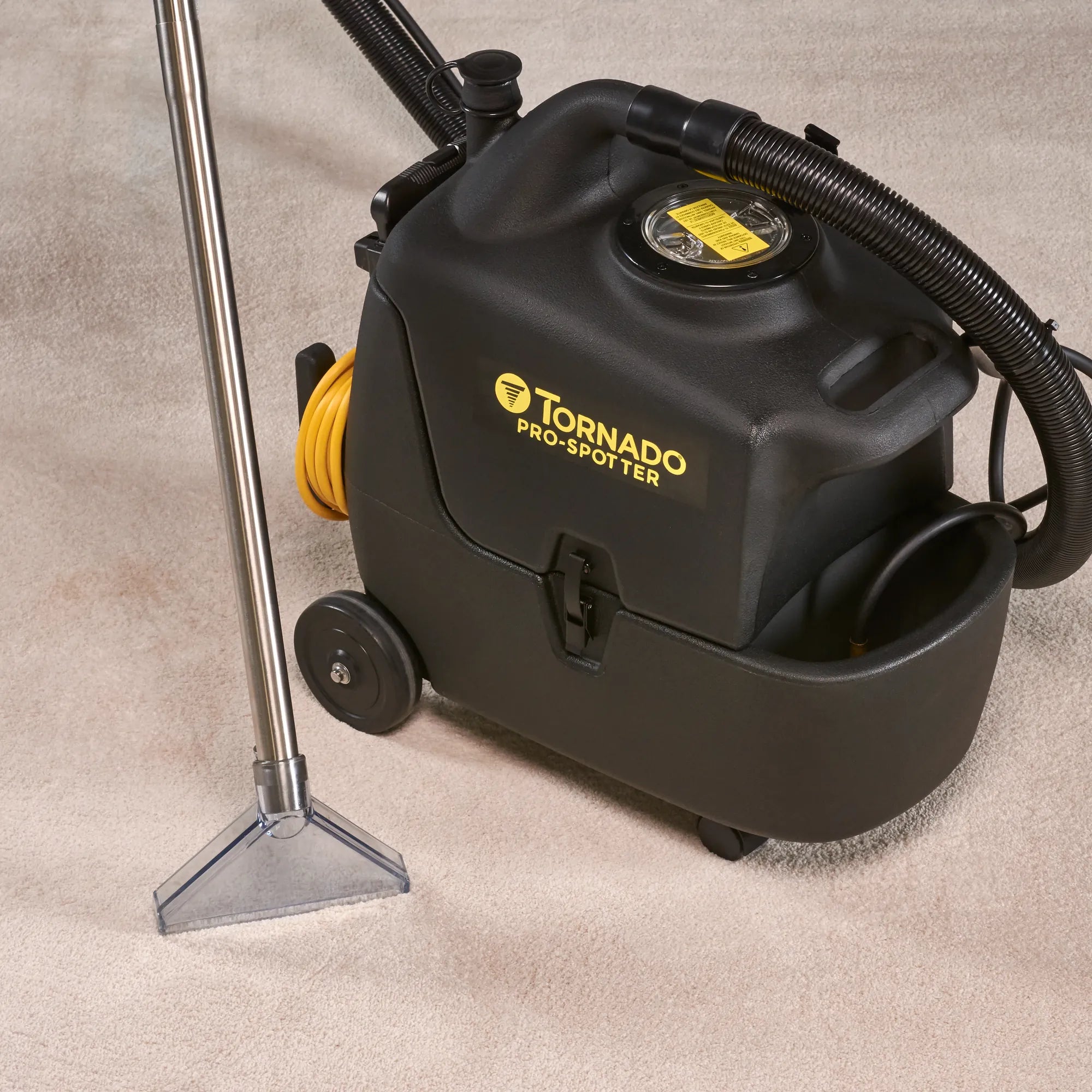 Tornado Pro Spotter portable carpet spotter cleaning carpet with the carpet wand from the Deluxe kit