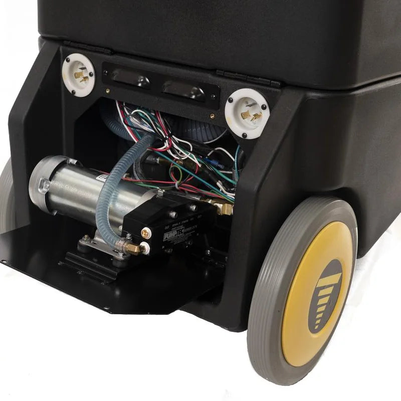 Rear service panel of a Tornado Surge carpet extractor opened, showing the pump and wiring inside
